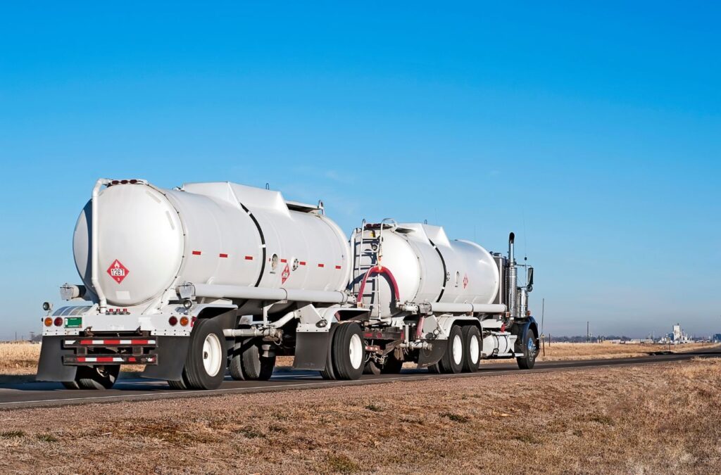 A tanker truck transporting Diesel Exhaust Fluid for DEF Delivery by Exhaustfluid, ensuring a steady supply for fleets and businesses.