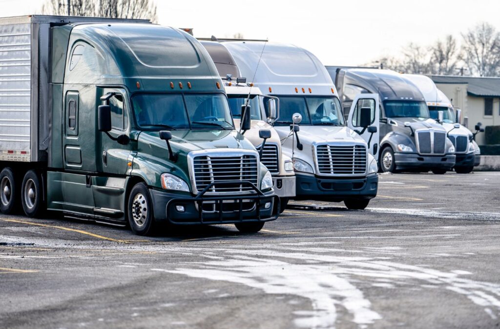 A fleet of trucks ready for DEF Delivery by Exhaustfluid, ensuring efficient operations with high-quality Diesel Exhaust Fluid supply.