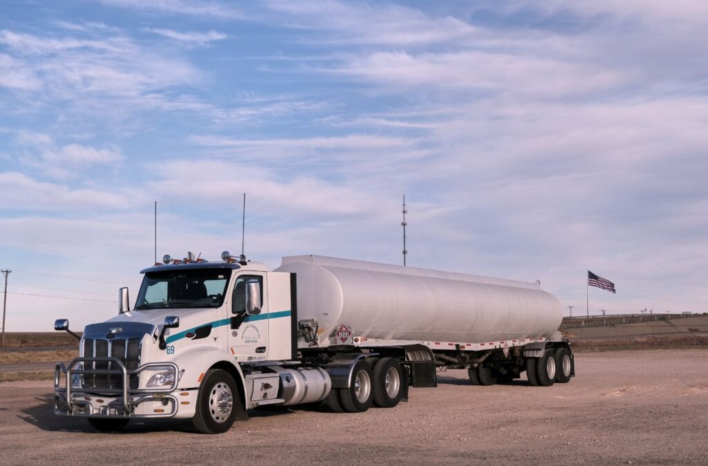 Exhaustfluid team member performing DEF delivery in Belknap County, NH, showcasing advantages of hiring local professionals for timely and dependable service.