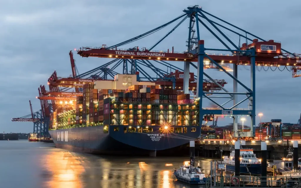 Commercial ship at a Norfolk, VA terminal during Marine AUS40 Delivery and vessel replenishment.